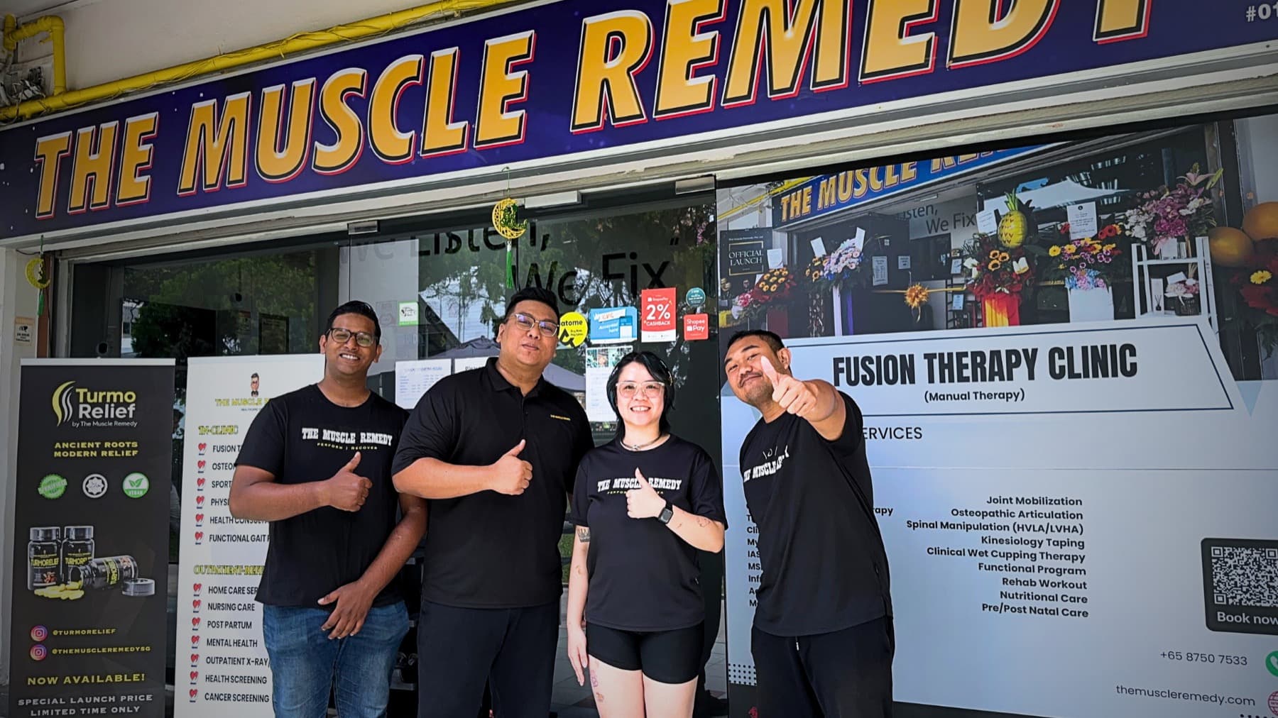 The Muscle Remedy team outside the clinic